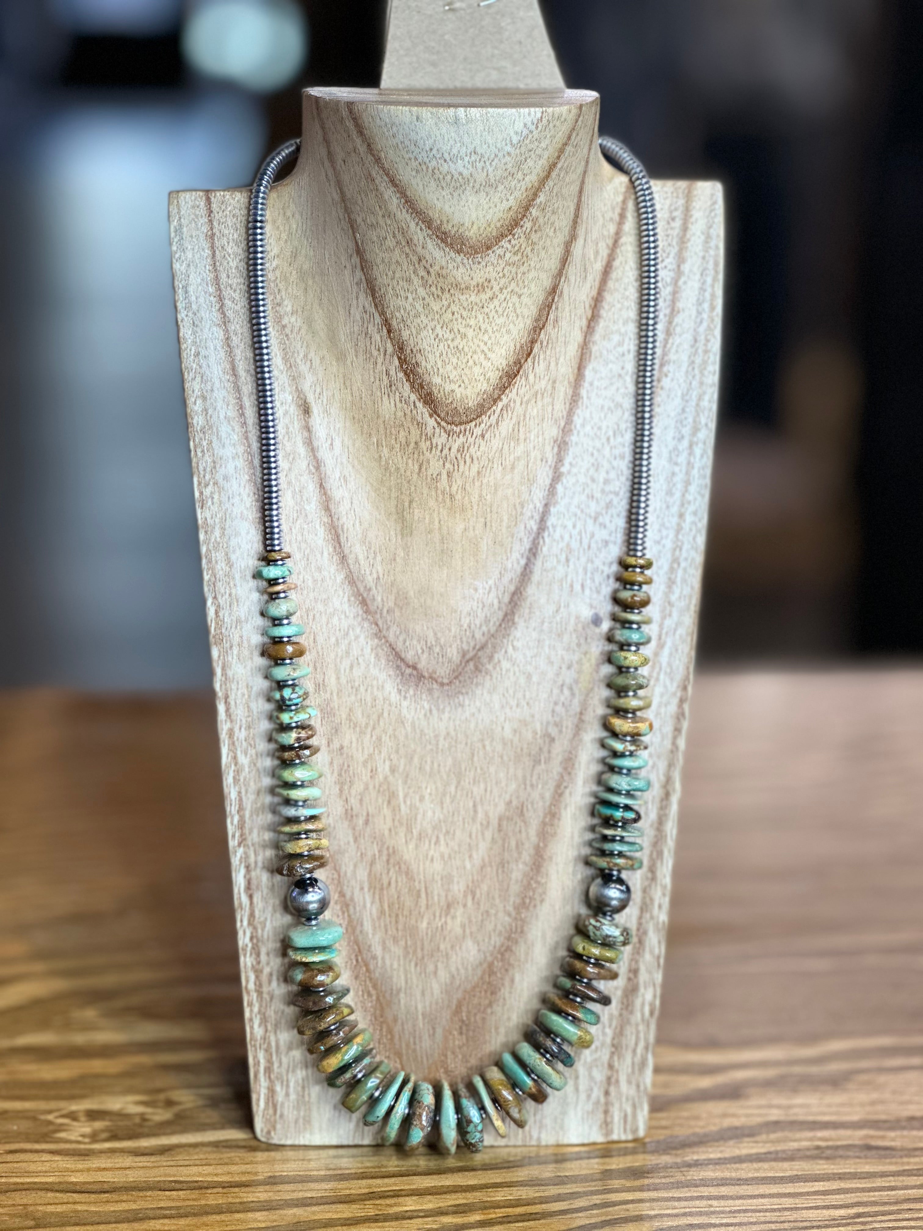 22 inch graduated turquoise necklace with Sterling silver pearls