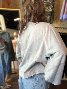 Oversized Bell-Sleeve Distressed Sweatshirt