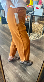 Load image into Gallery viewer, Rust Curved Cropped Pants
