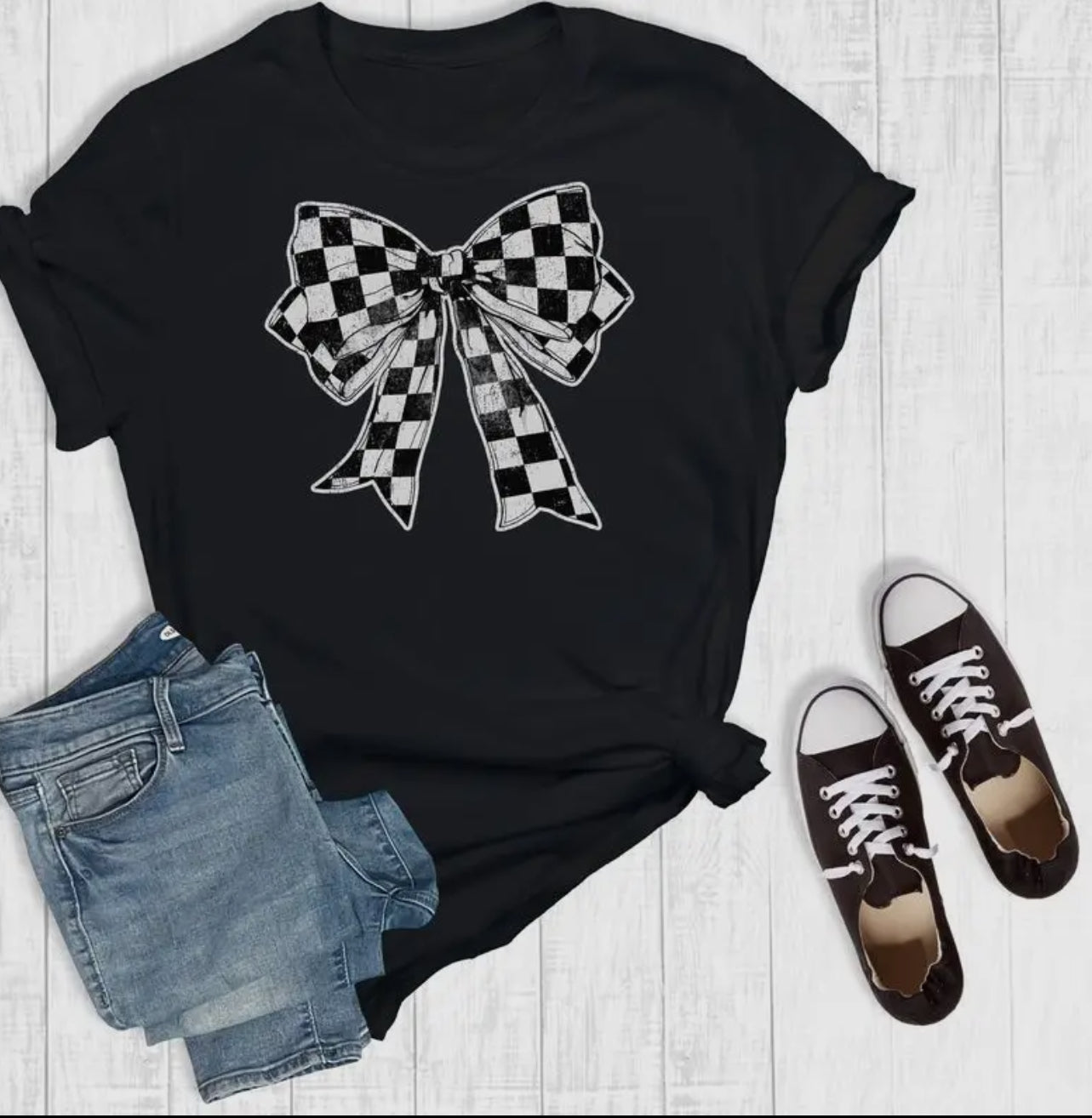 Checkered Coquette Bow Black
Graphic T-shirt