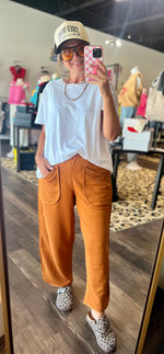 Load image into Gallery viewer, Rust Curved Cropped Pants
