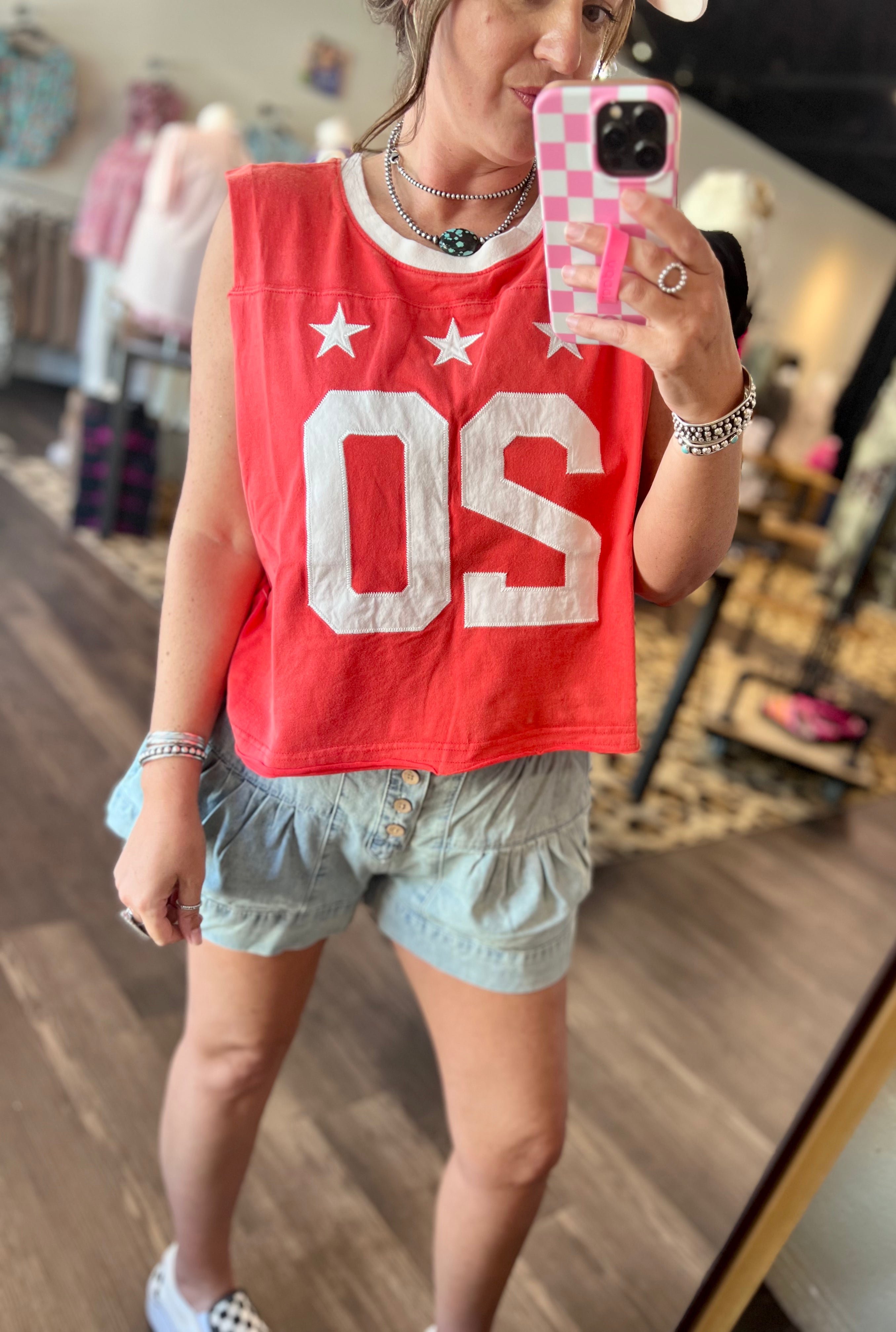 Red embroidered muscle tank