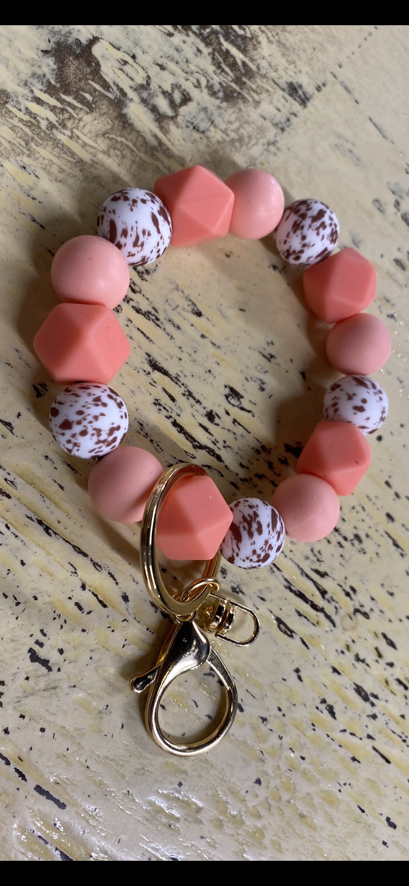 Coral/Brown Cow print Silicone Wristlet Keychain